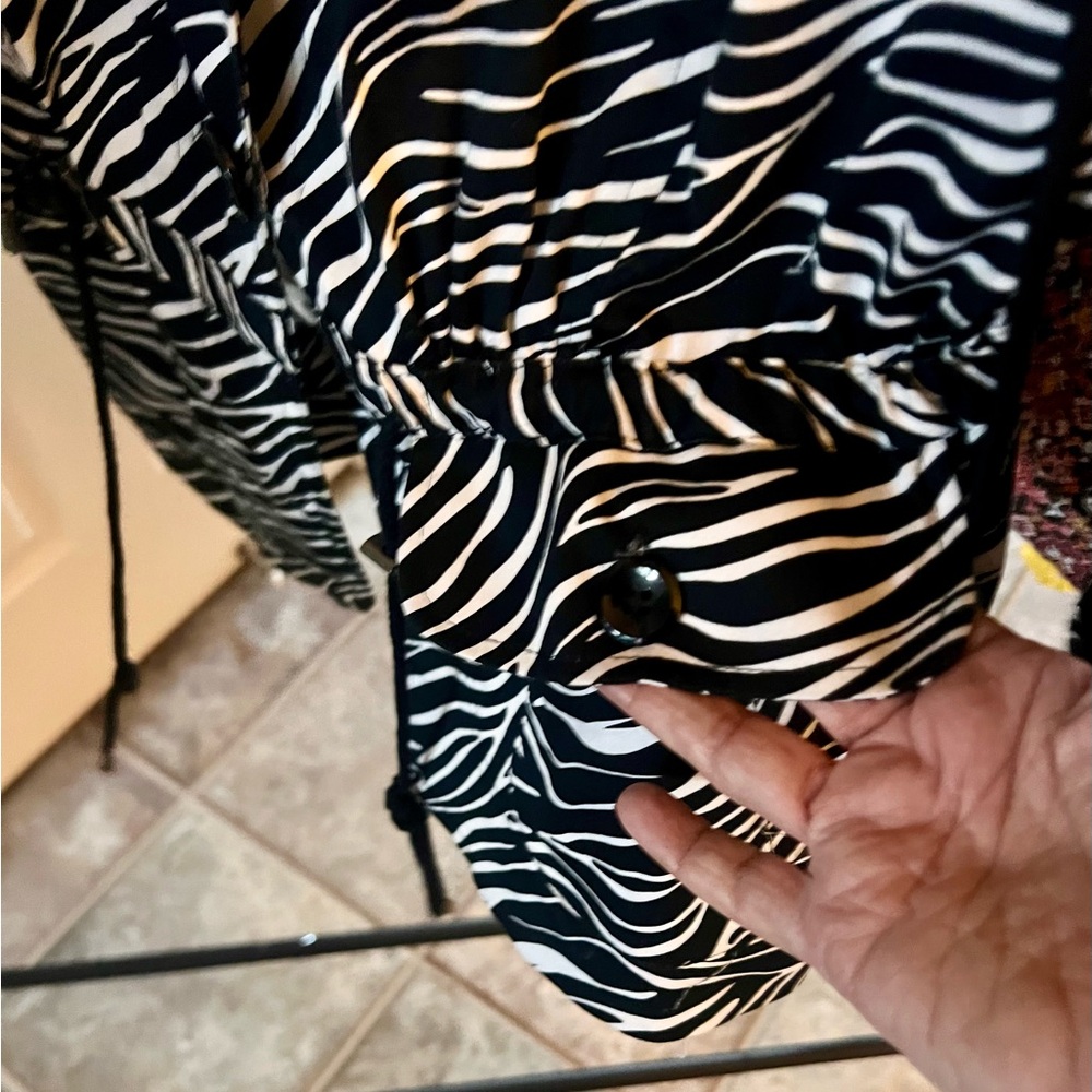 Adorable zebra print jacket with drawstring